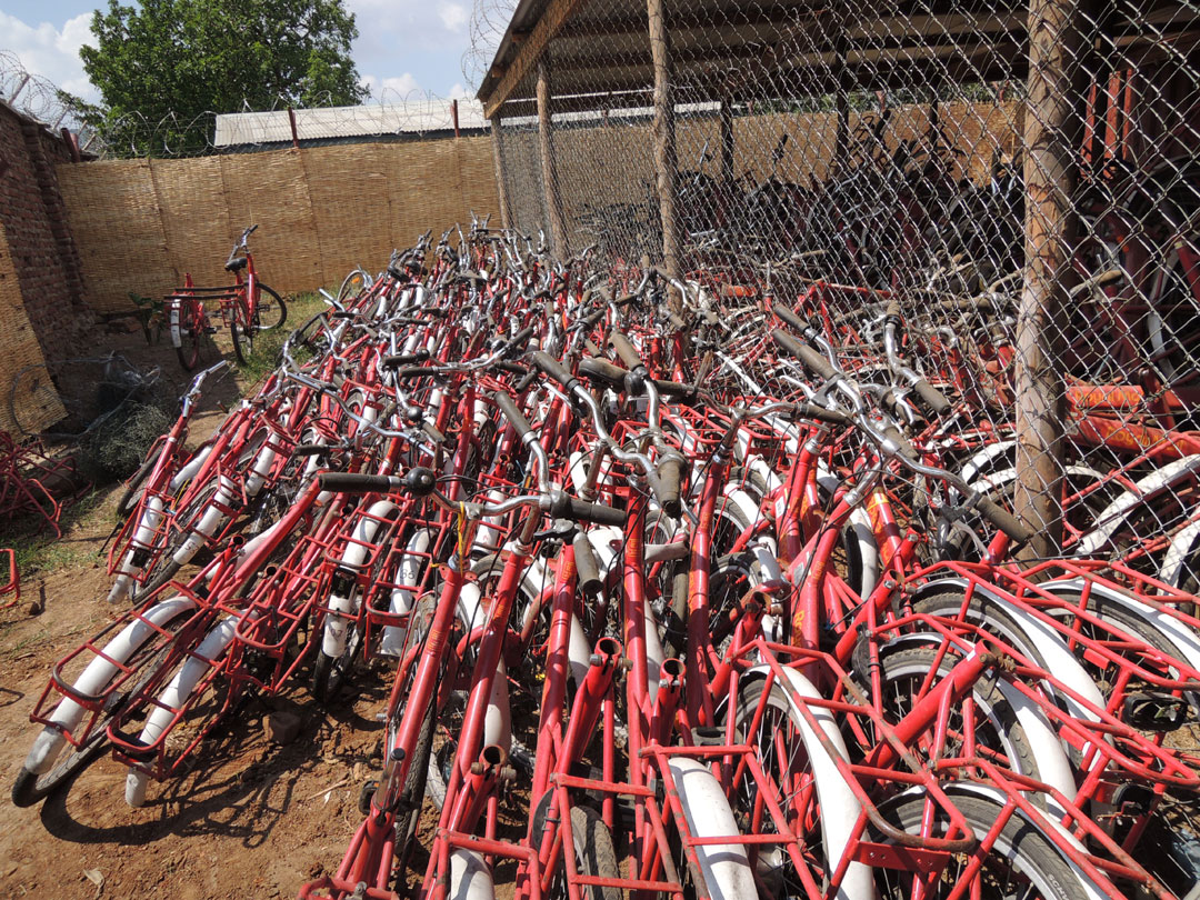 Royal Mail bikes awaiting refurbishment in Malawi.